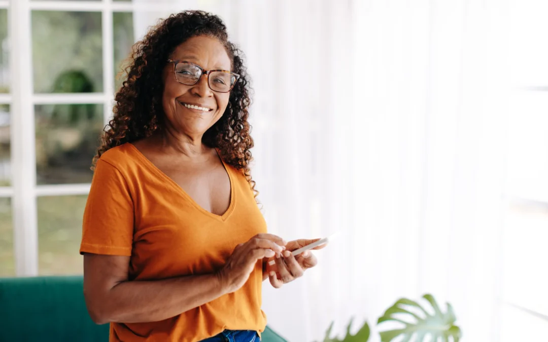 happy women looking at phone